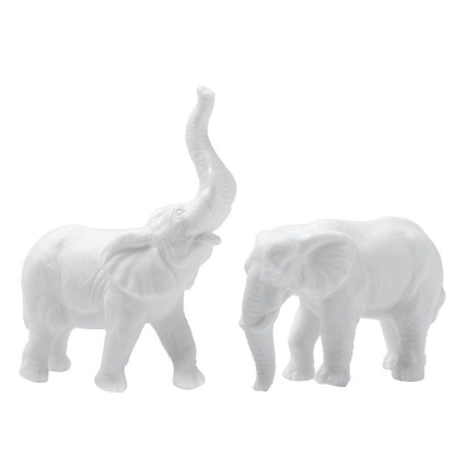 Glückliche weiße Elefantenfiguren - Minimalistisches Porzellandekor